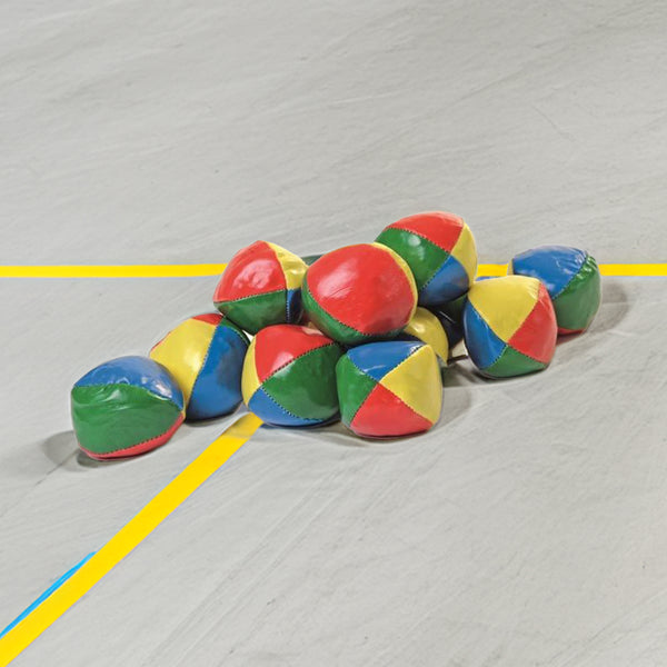 Colorful set of 12 soft juggling balls in red, blue, yellow, and green, with a slightly cubic shape for stability.